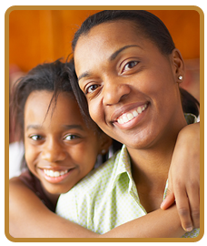 woman and girl smiling